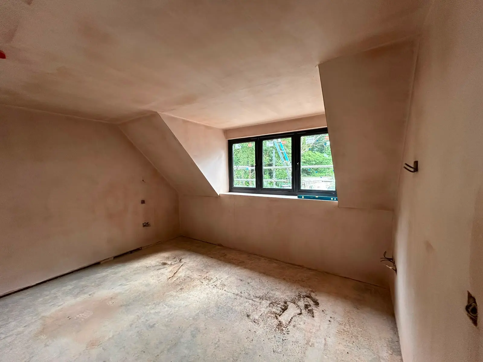 Freshly skimmed loft room interior — a real LMJ project